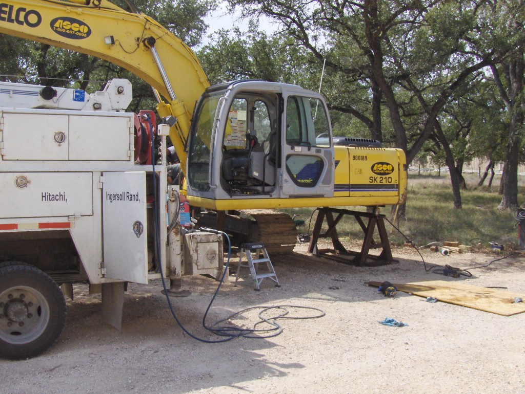 mechanic excavator cab removal and repair