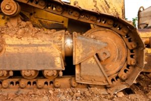 Heavy equipment track undercarriage close up detail San Antonio Texas A.L. Boeck and Co.
