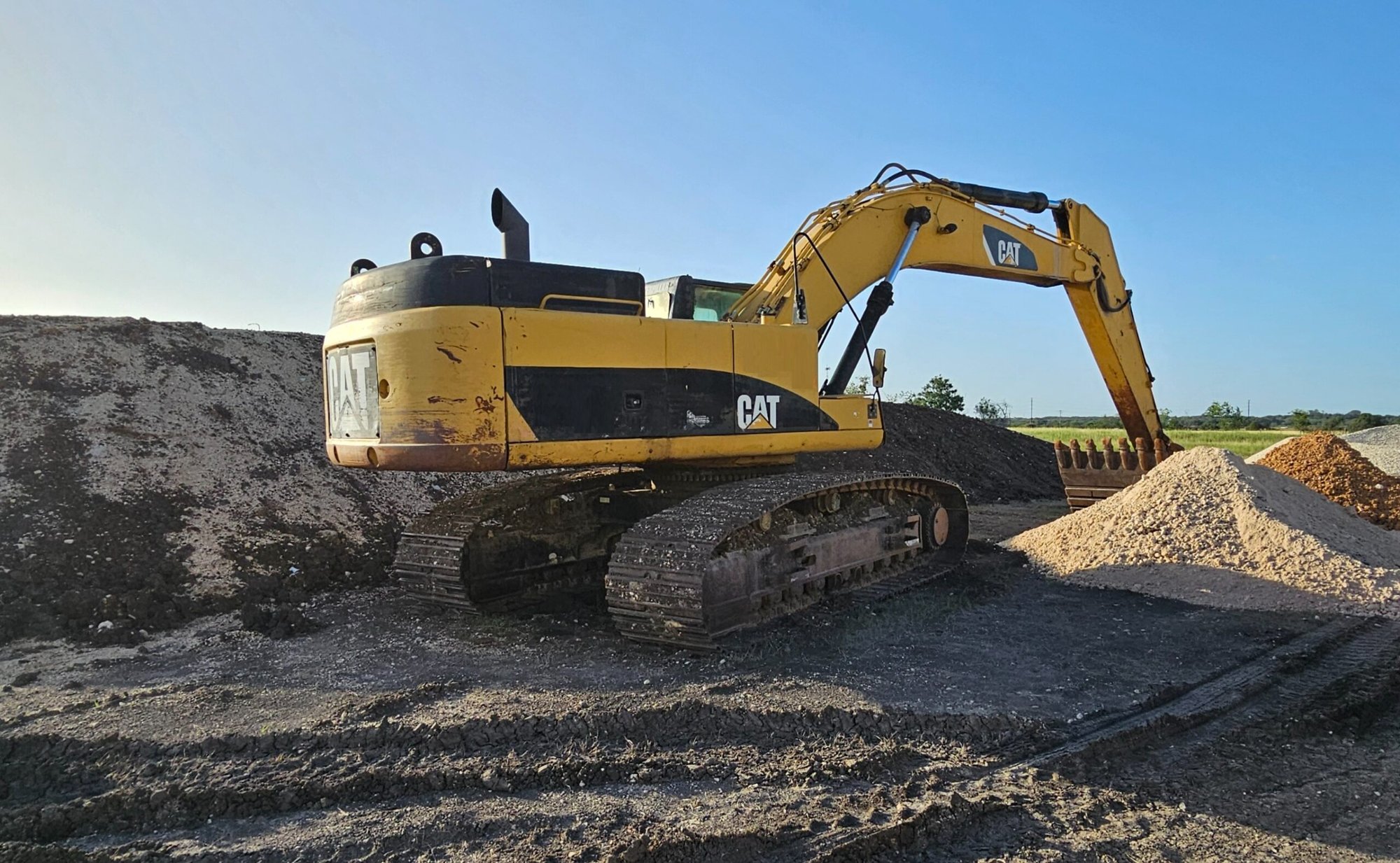 CAT excavator on job site San Antonio Texas heavy equipment repair A.L. Boeck and Co.